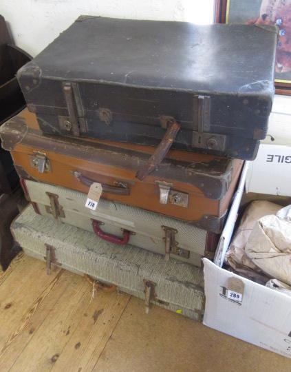 FOUR VINTAGE SUITCASES Image