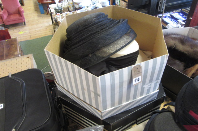 THREE HATS AND TWO HAT BOXES Image