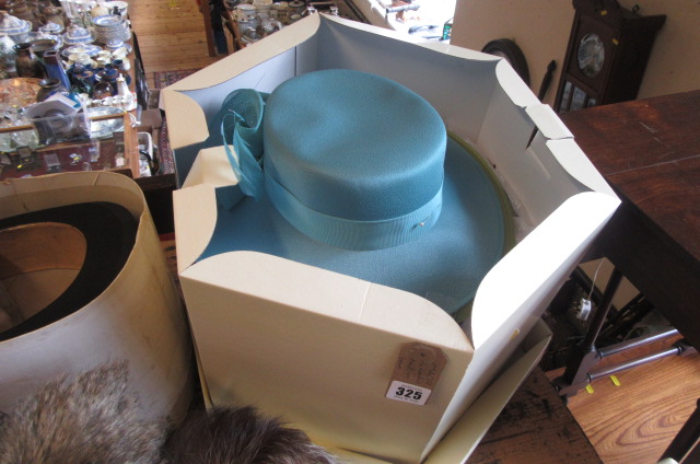 FOUR HATS AND HAT BOX Image
