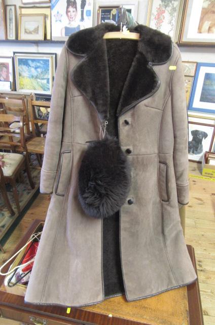 LADY'S SHEEPSKIN COAT AND A HAT Image