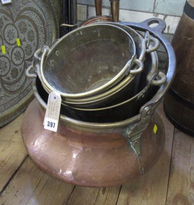 THREE BRASS BUCKETS AND A COPPER CAULDRON Image
