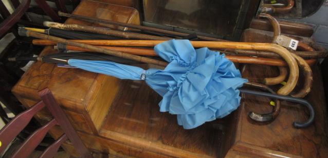 QUANTITY OF WALKING STICKS AND UMBRELLAS Image