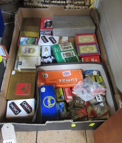 BOX OF PLAYING CARDS AND CAR PARTS Image