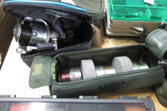 CASED FISHING REEL AND CASED SPOOLS Image