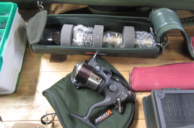 CASED FISHING REEL AND CASED SPOOLS Image