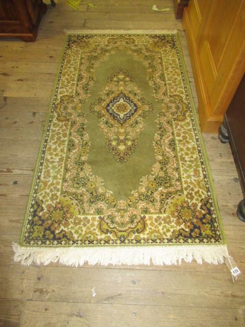 GREEN FRINGED RUG Image