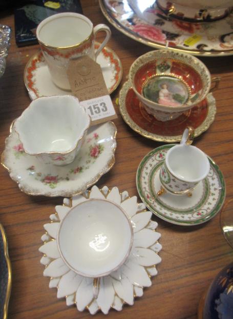 COLLECTION OF PORCELAIN CUPS AND SAUCERS Image