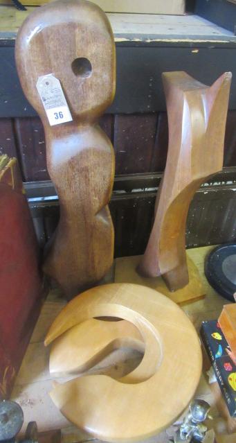 FOUR WOODEN ABSTRACT CARVINGS Image