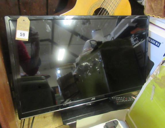 24 INCH JVC TV AND REMOTE Image