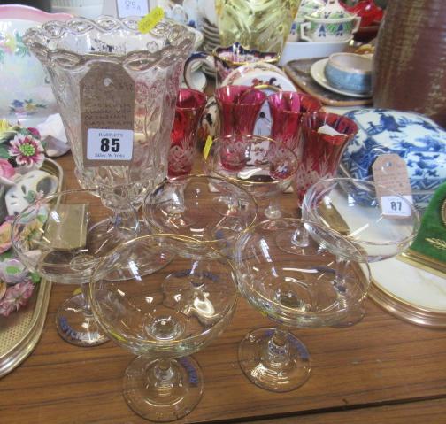 SET OF BABYCHAM GLASSES WITH CRANBERRY GLASS AND CELERY VASE Image