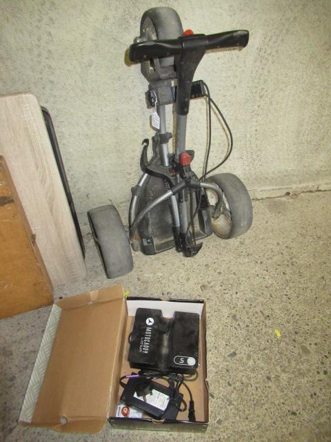 MOTOCADDY GOLF TROLLEY AND BATTERY CHARGER Image