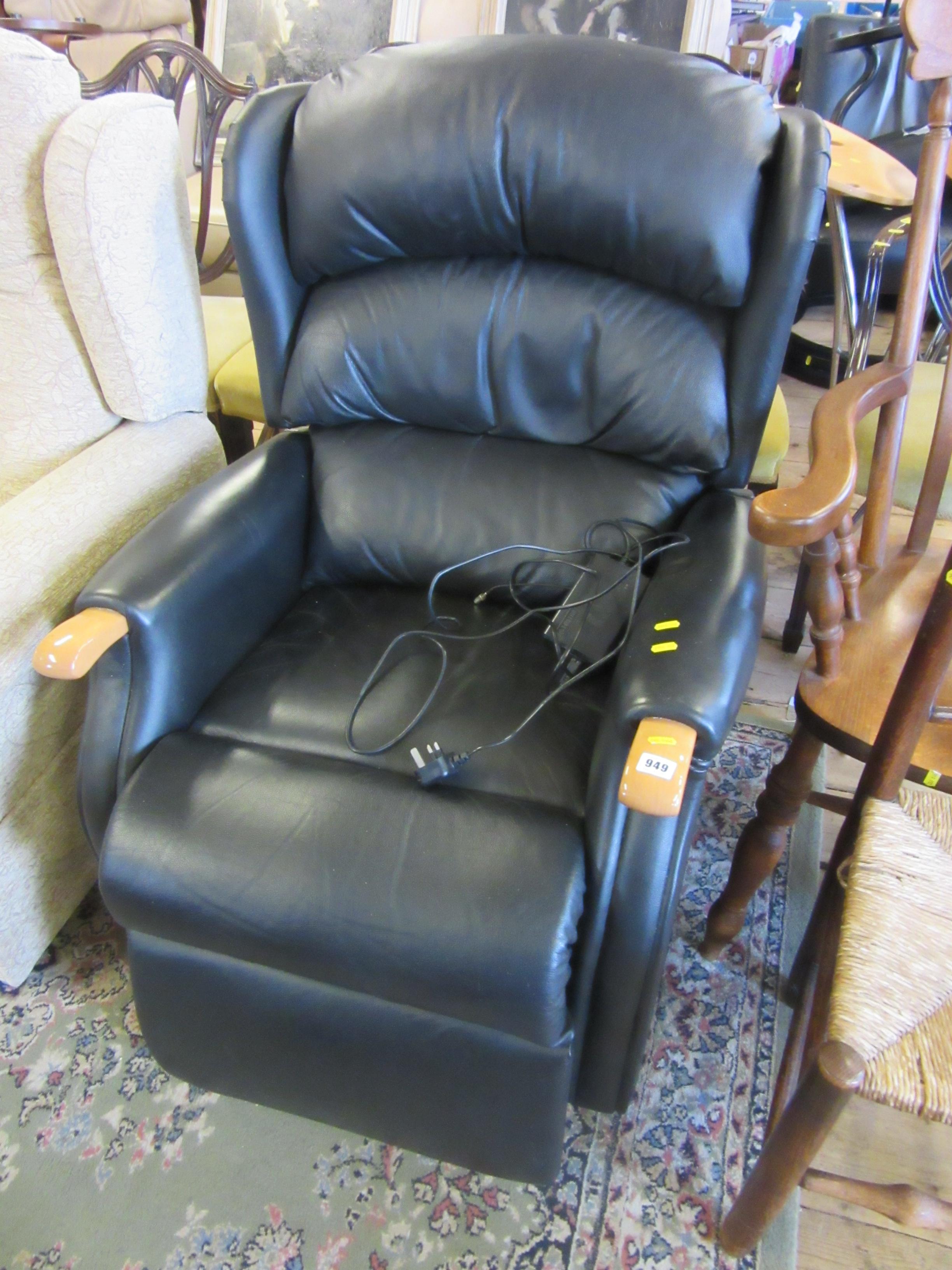 BLACK LEATHER RECLINING ARMCHAIR Image