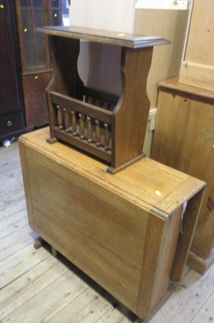 OAK DROP LEAF TABLE AND A MAGAZINE RACK Image