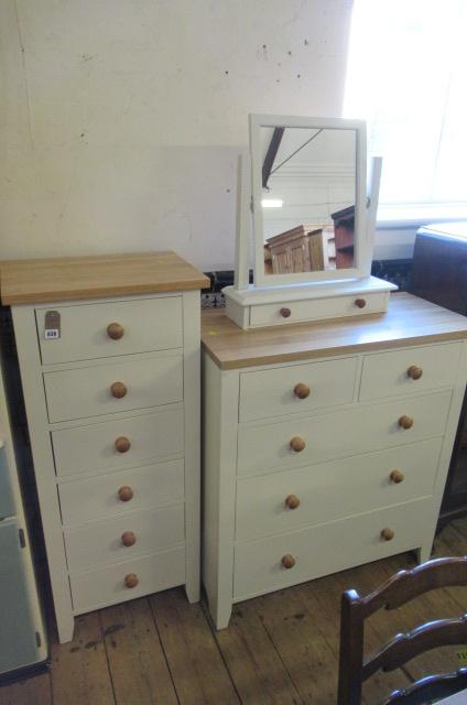 TWO CHESTS OF DRAWERS AND A MIRROR Image