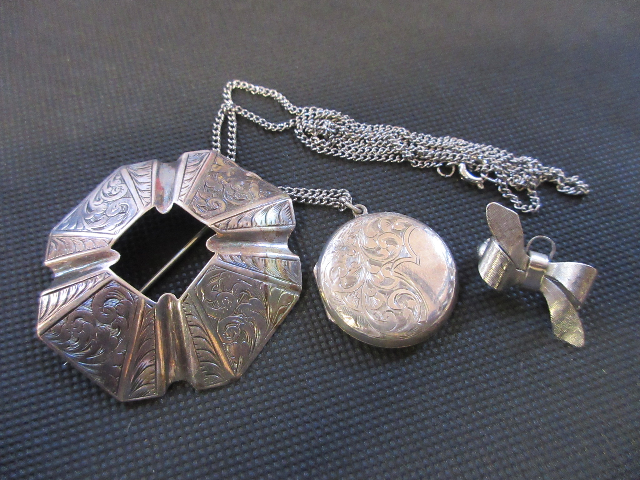 SILVER LOCKET AND TWO OTHERS Image