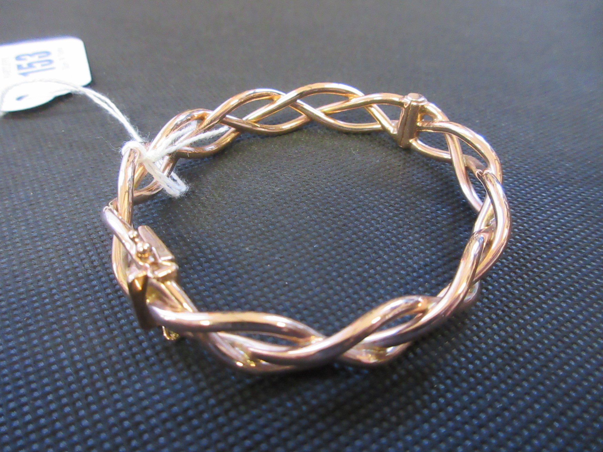 9CT GOLD TWIST STIFF HINGED BANGLE - 19.5G Image