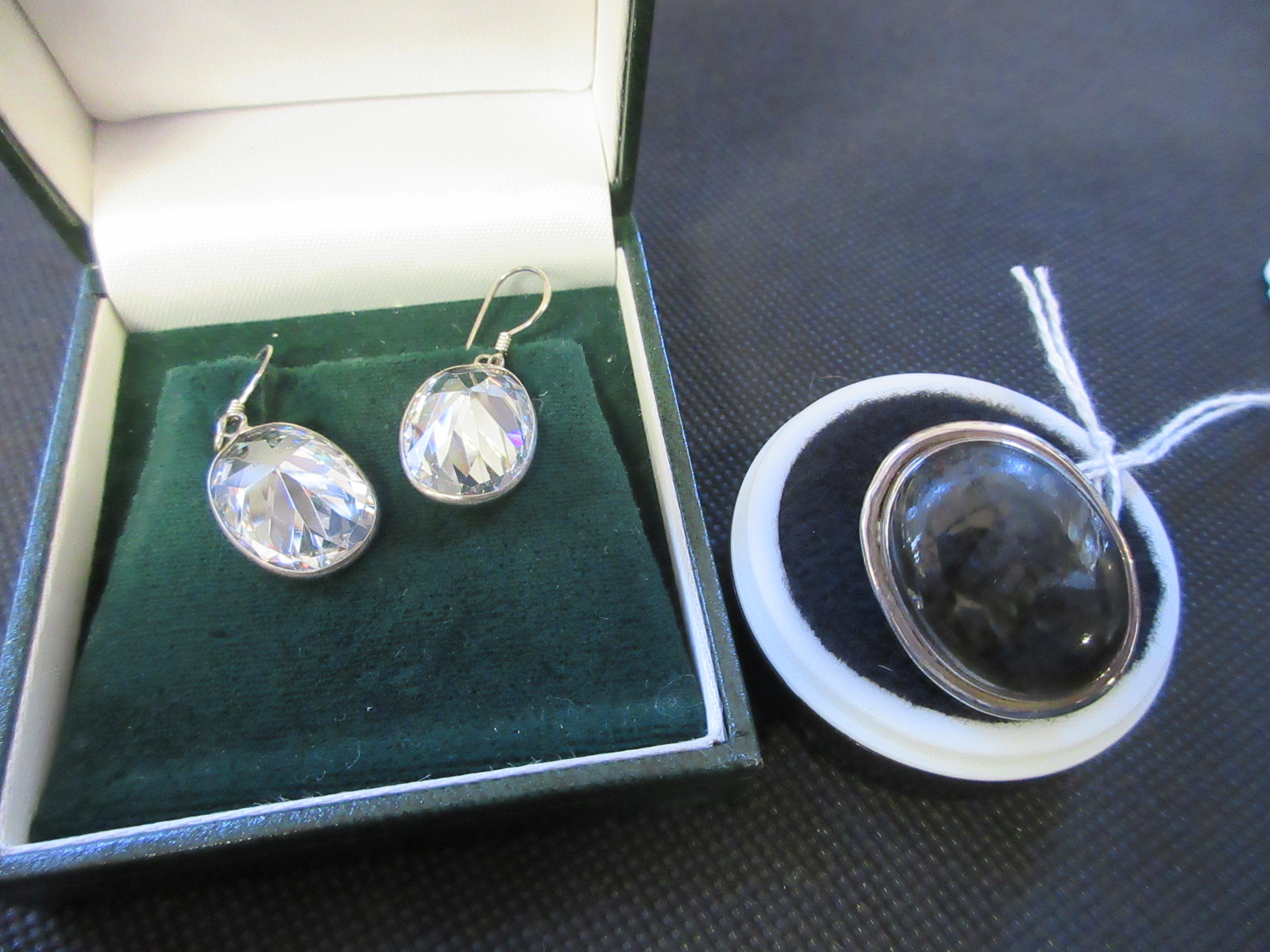 SILVER RING AND A PAIR OF CRYSTAL EARRINGS Image