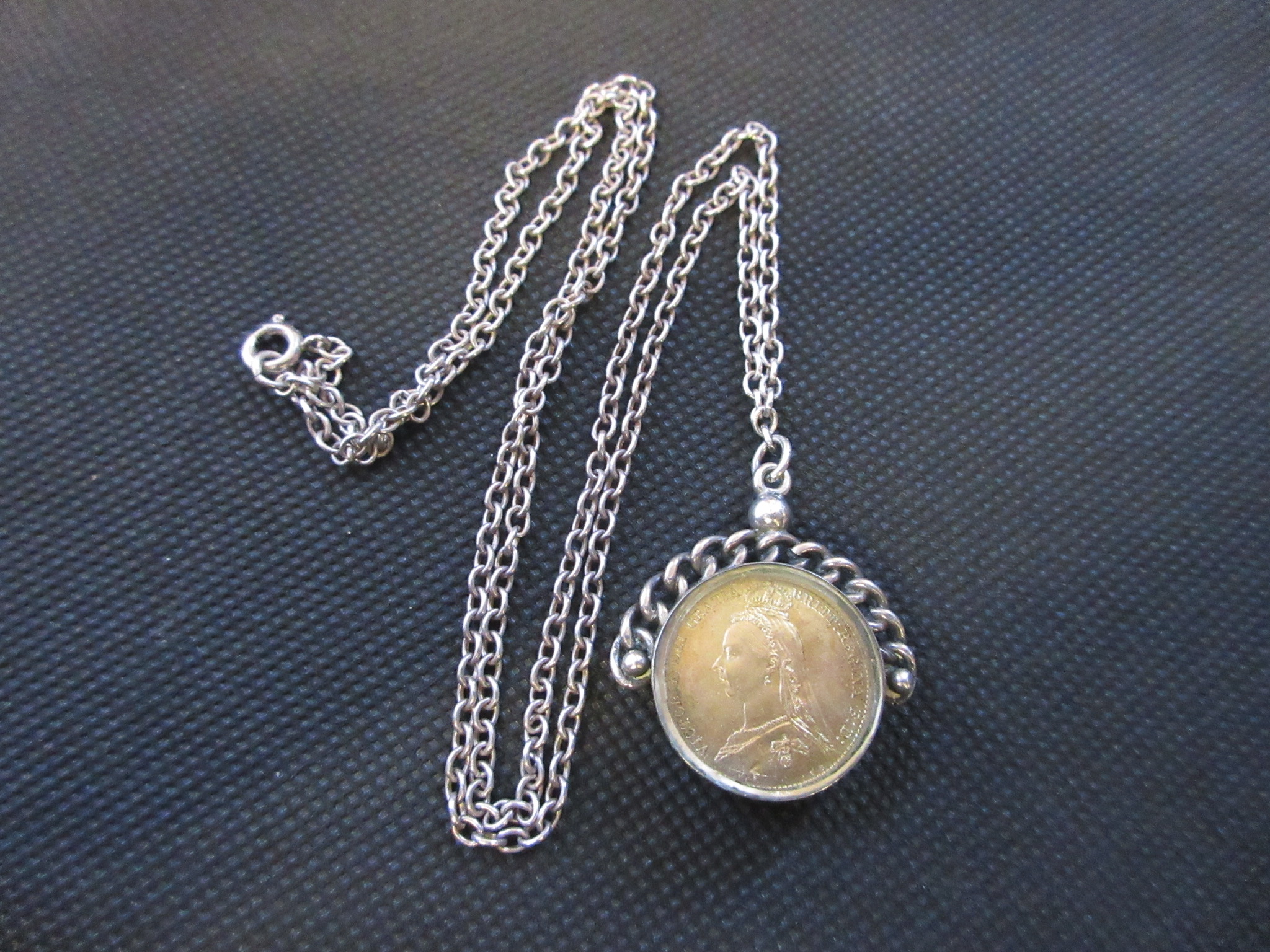 SILVER MOUNTED VICTORIAN SIXPENCE Image