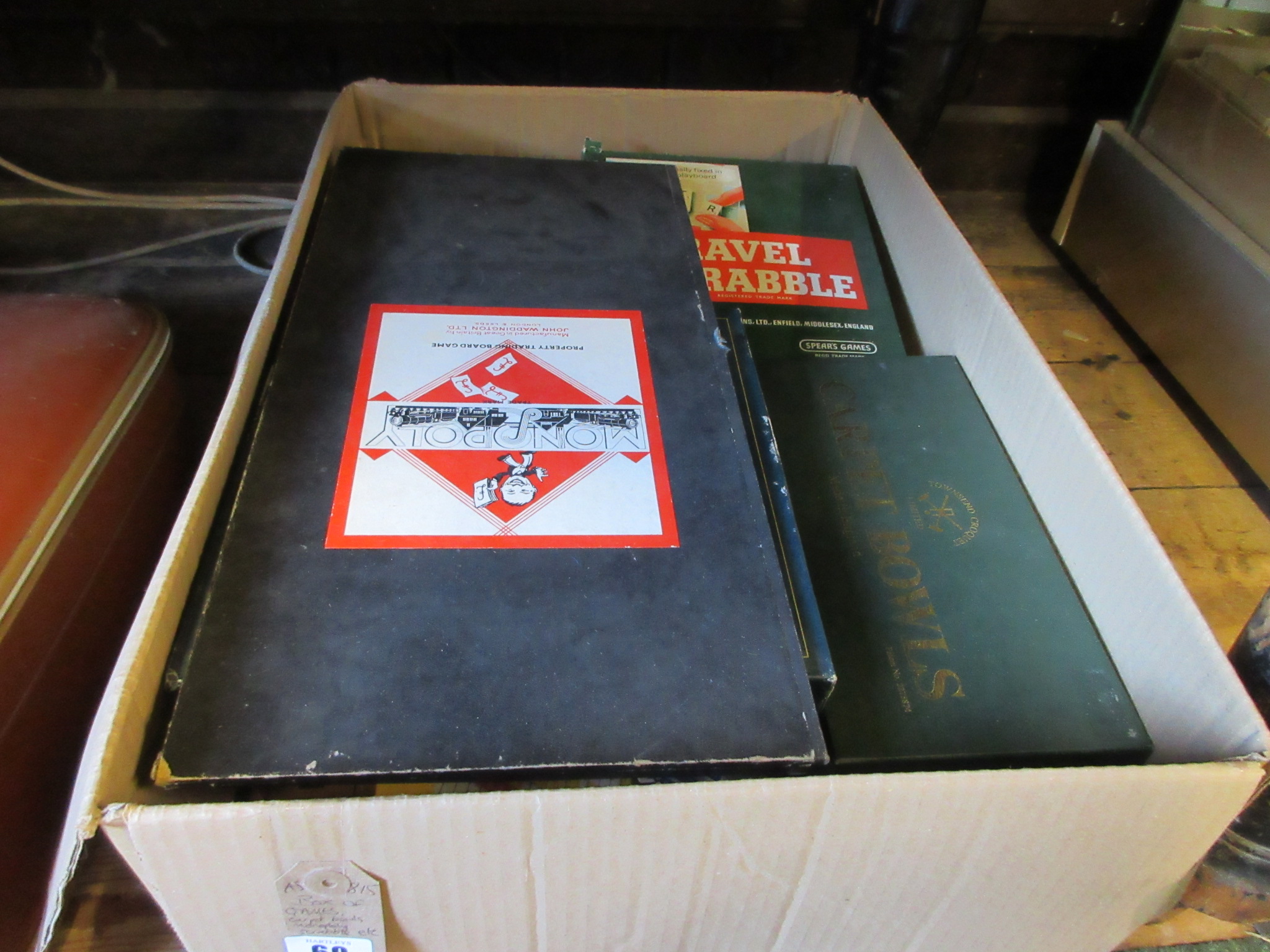 BOX OF GAMES, CARPET BOWLS, MONOPOLY AND SCRABBLE Image
