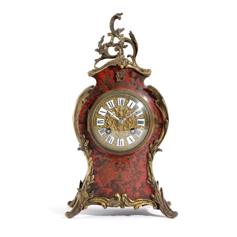 Λ a french boulle marquetry mantel clock Woolley and Wallis