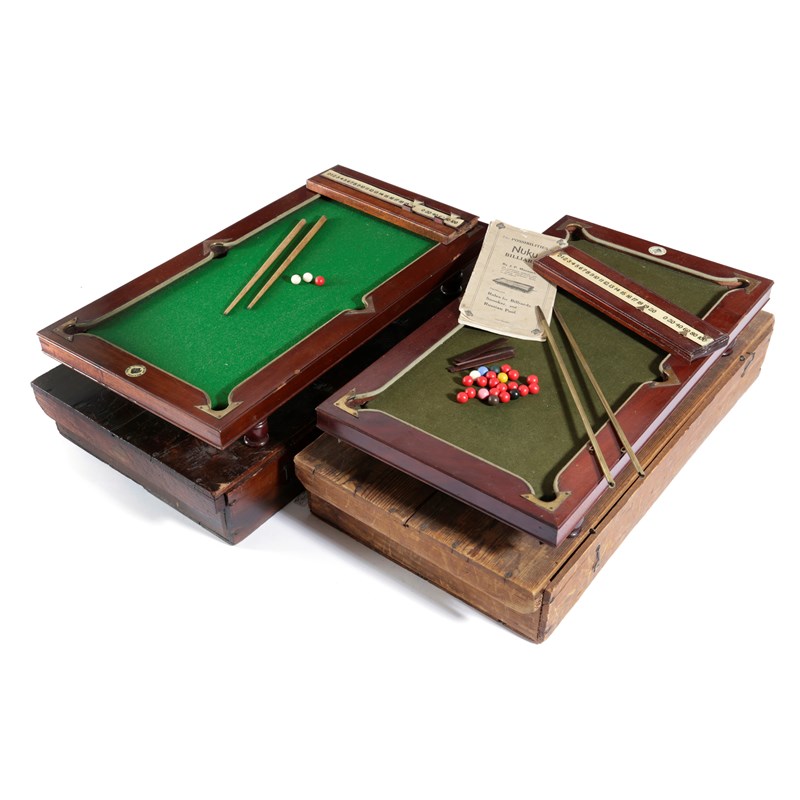 A mahogany and brass mounted miniature billiards table Woolley and Wallis