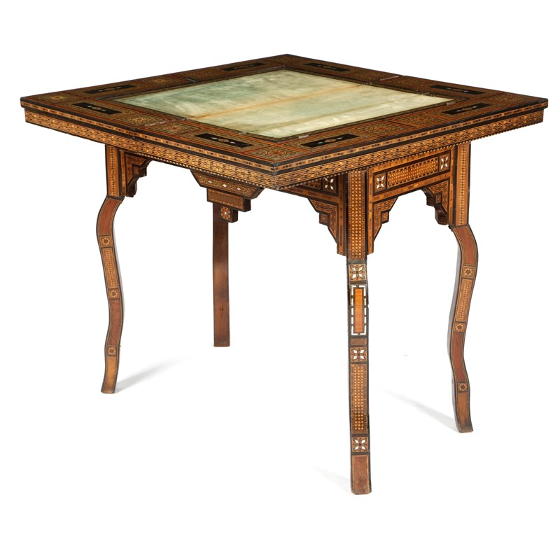 A moorish walnut and parquetry games table | Woolley and Wallis