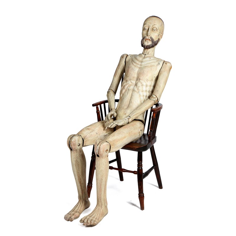 A life-size carved and painted wood mannequin or processional saint ...
