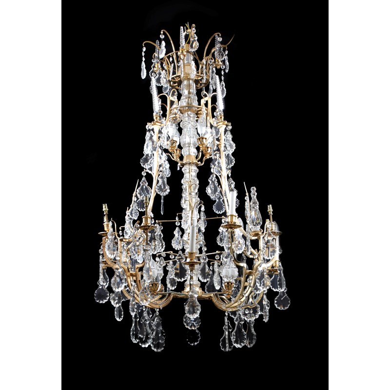 A french gilt metal and cut glass sixteen light chandelier | Woolley ...