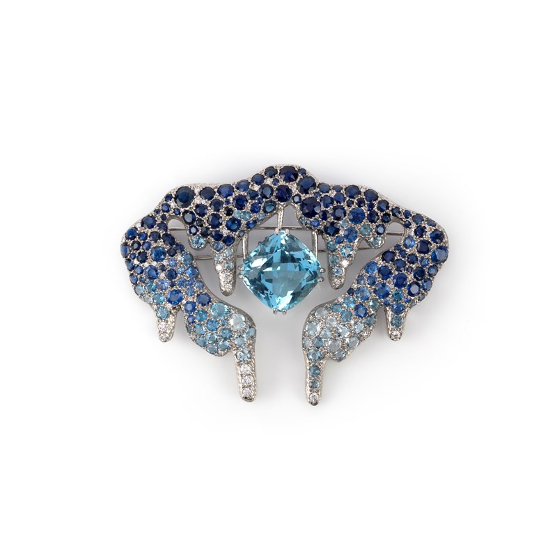 E.w wolfe & co., an aquamarine, sapphire and diamond brooch, set with a ...