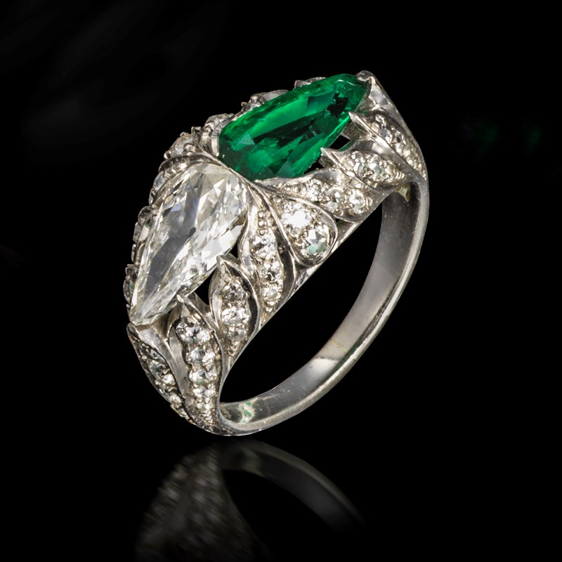 An early 20th century emerald and diamond cluster ring | Woolley and Wallis