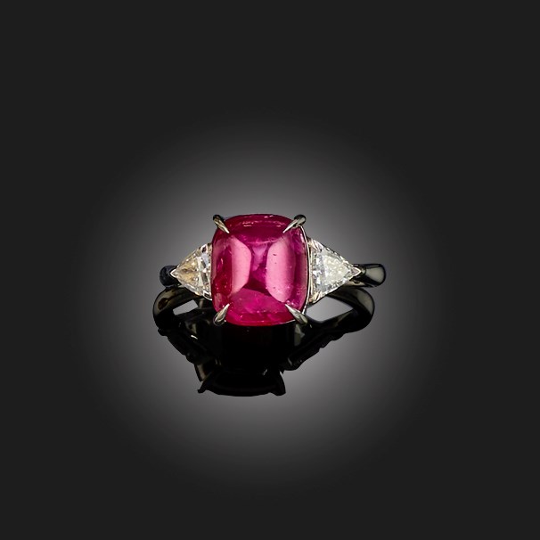 A ruby and diamond three stone ring | Woolley and Wallis
