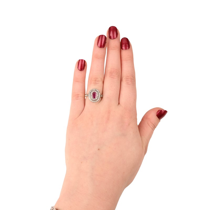 A ruby and diamond cluster ring | Woolley and Wallis