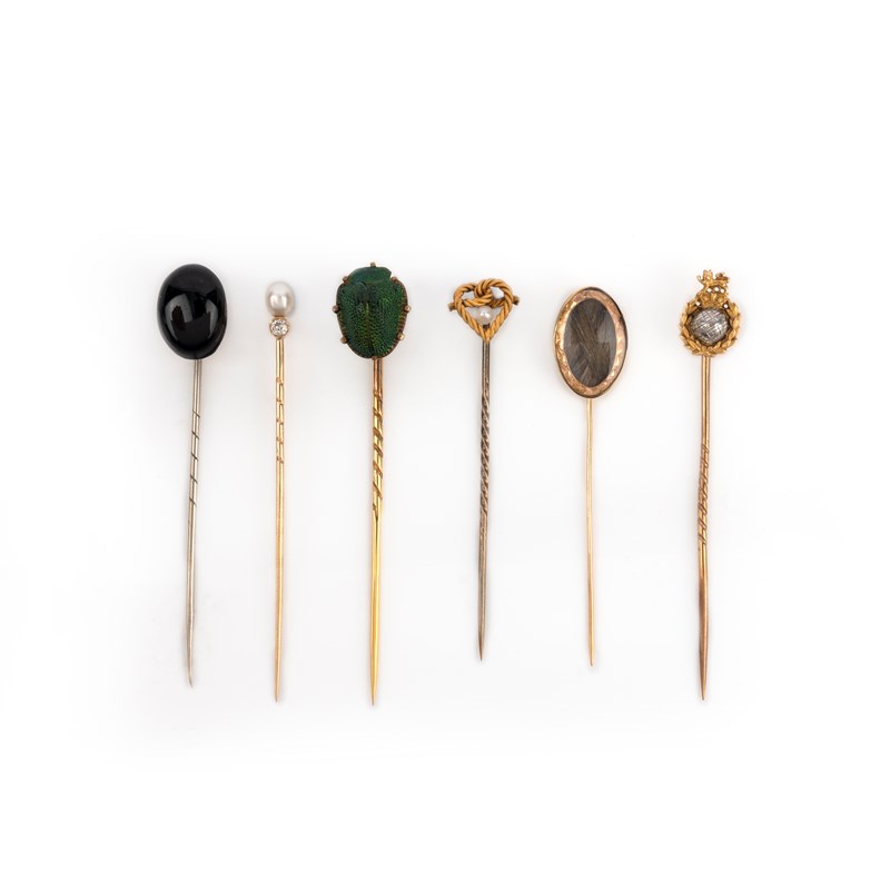 A collection of six stick pins, late 19th/early 20th century ...