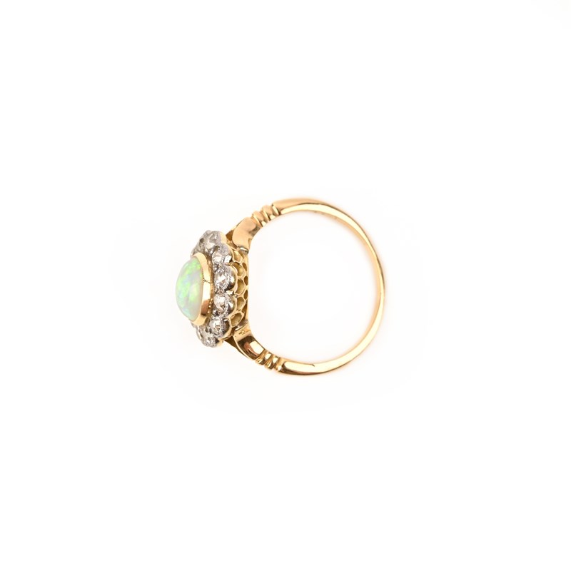 An opal and diamond cluster ring | Woolley and Wallis