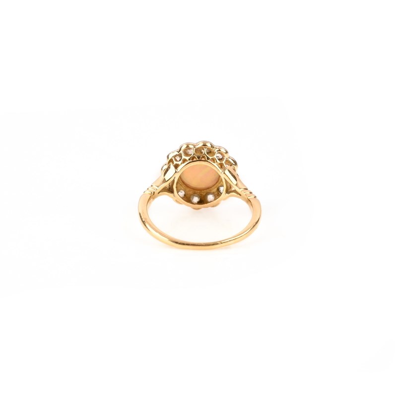An opal and diamond cluster ring | Woolley and Wallis