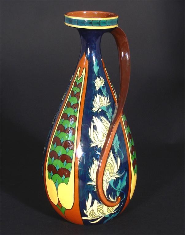 A foley intarsio vase designed by frederick rhead | Woolley and Wallis