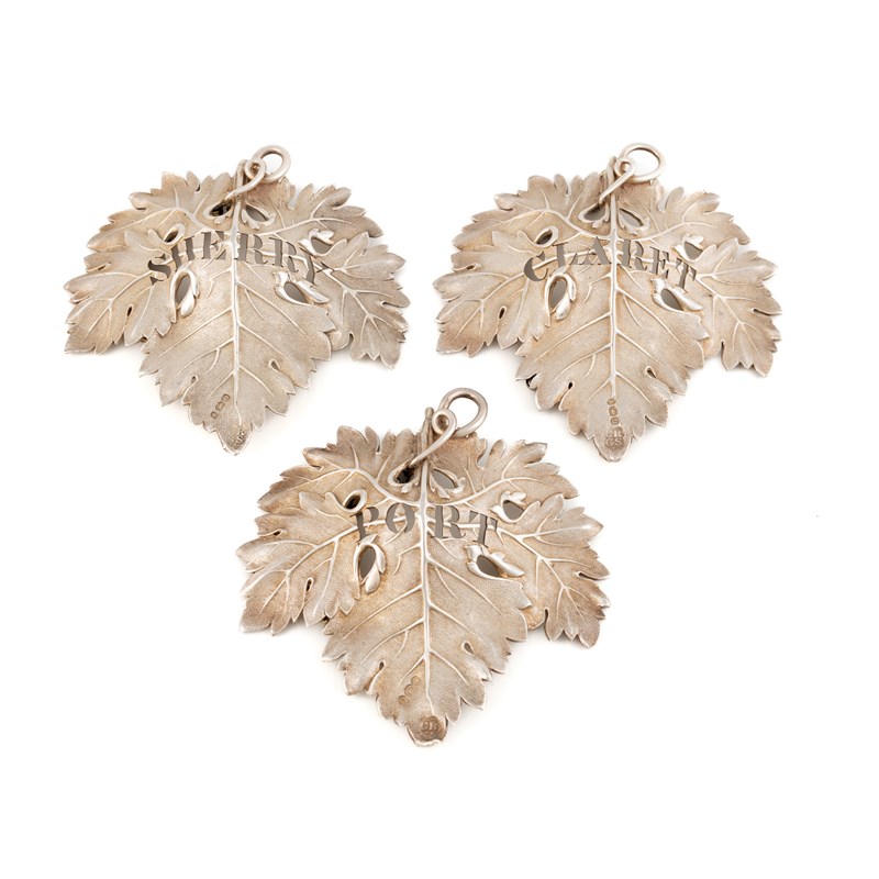 William Labes A set of three william iv silver large wine labels, | Woolley and Wallis