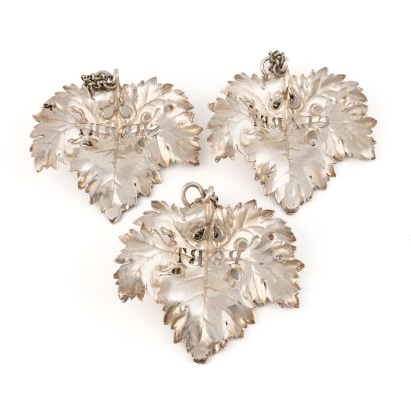 William Labes A set of three william iv silver large wine labels, | Woolley and Wallis