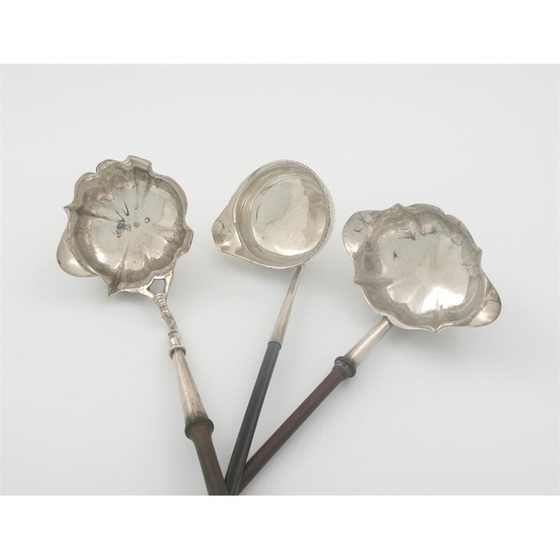 Three punch ladles a iii doublelipped example Woolley and Wallis