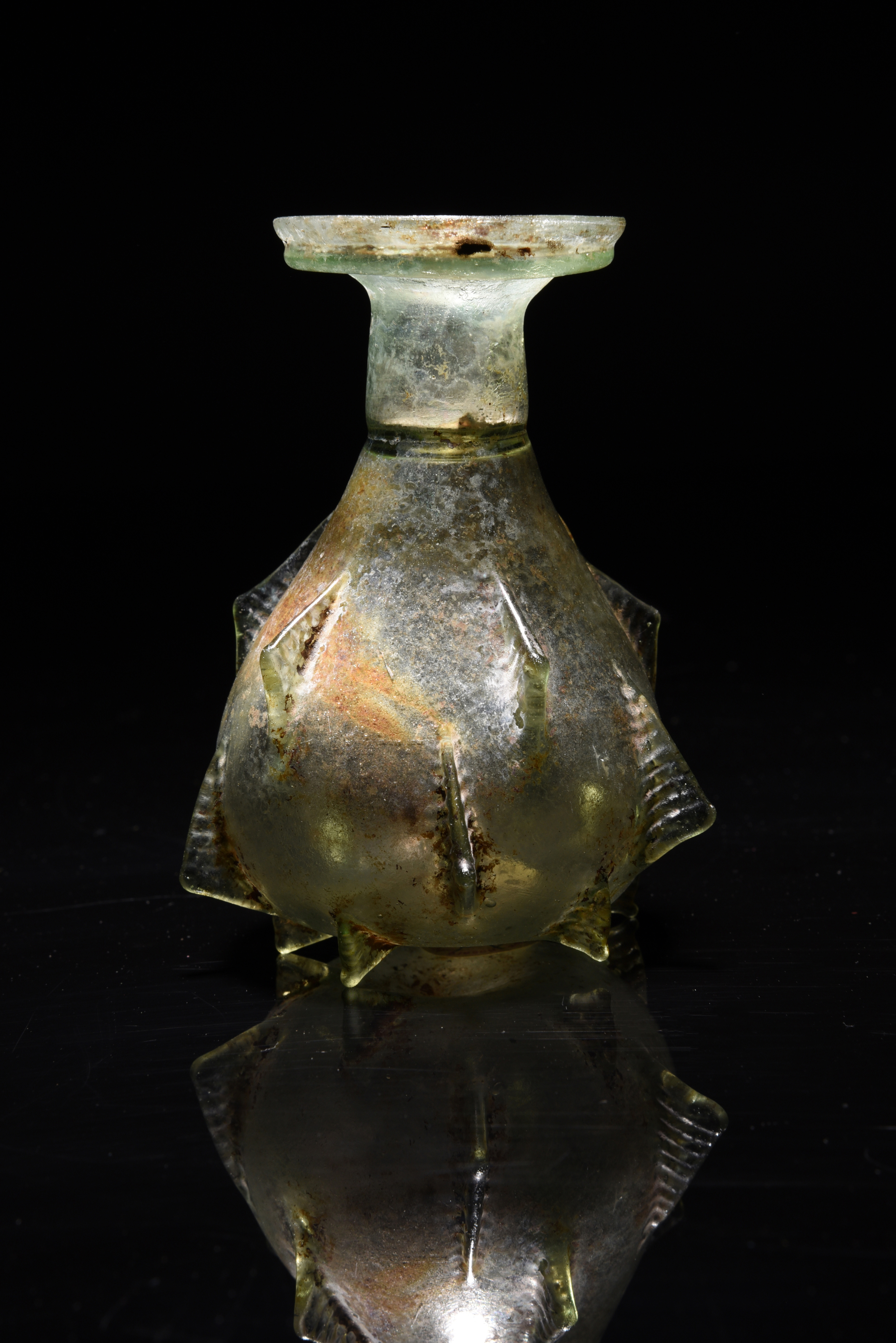 A Roman pale green glass sprinkler flask